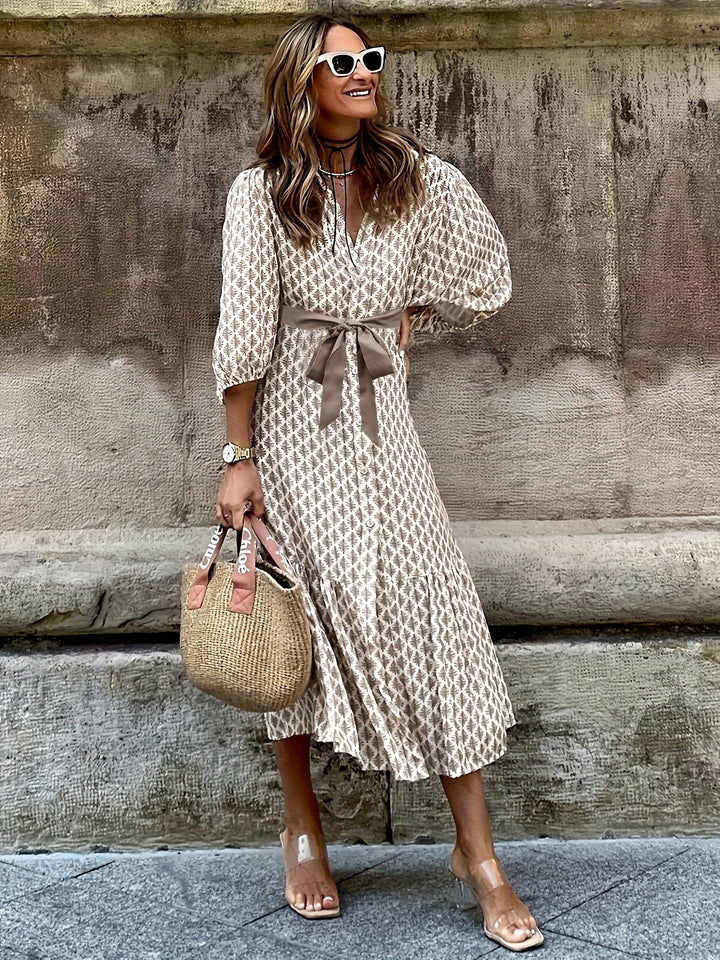 Robe longue élégante femme avec boutons et nœud