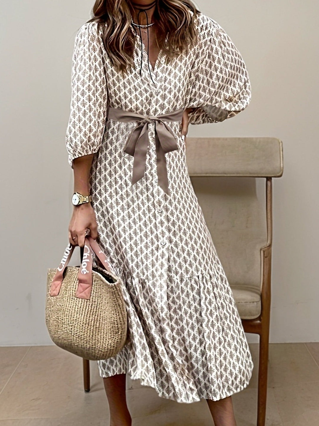 Robe longue élégante femme avec boutons et nœud