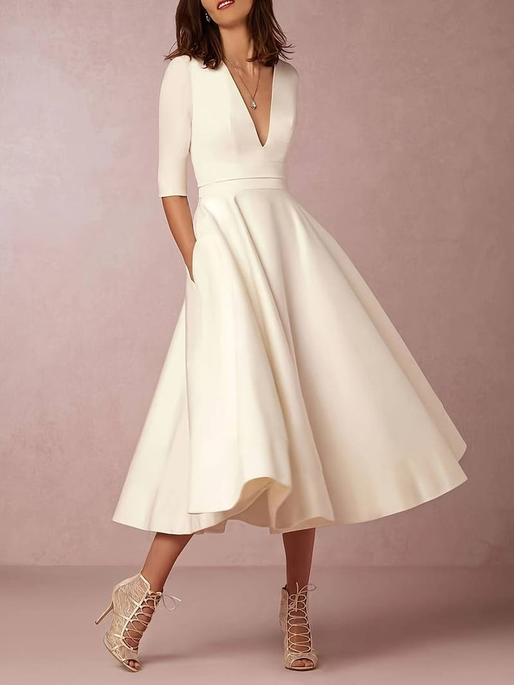 Robe classique élégante à col en V pour femme